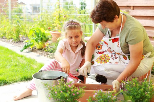 Gardeners in Snaresbrook working on a well-kept residential garden